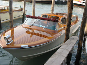 A professional shrink-wrapped boat showcasing protection and quality.