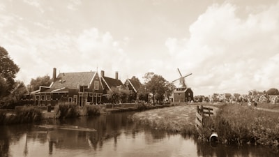 A serene Dutch landscape symbolizing growth and legacy under a clear sky.