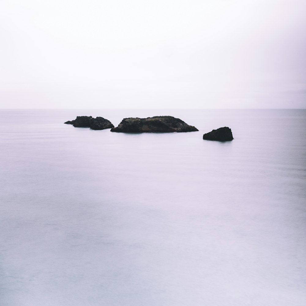 grayscale photo of body of water