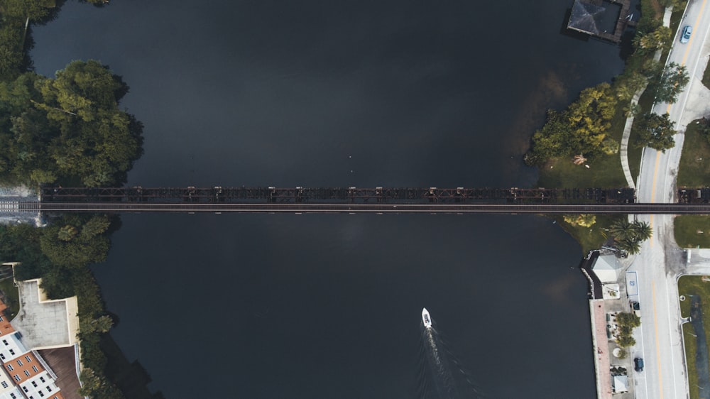 aerial view of black suspension bridge