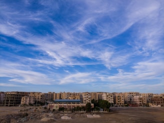 A panoramic view of a prime residential plot on Ajmer Road with clear blue skies.