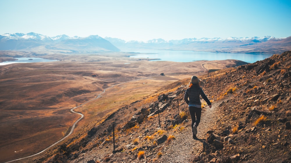 shallow focus photography of woman running