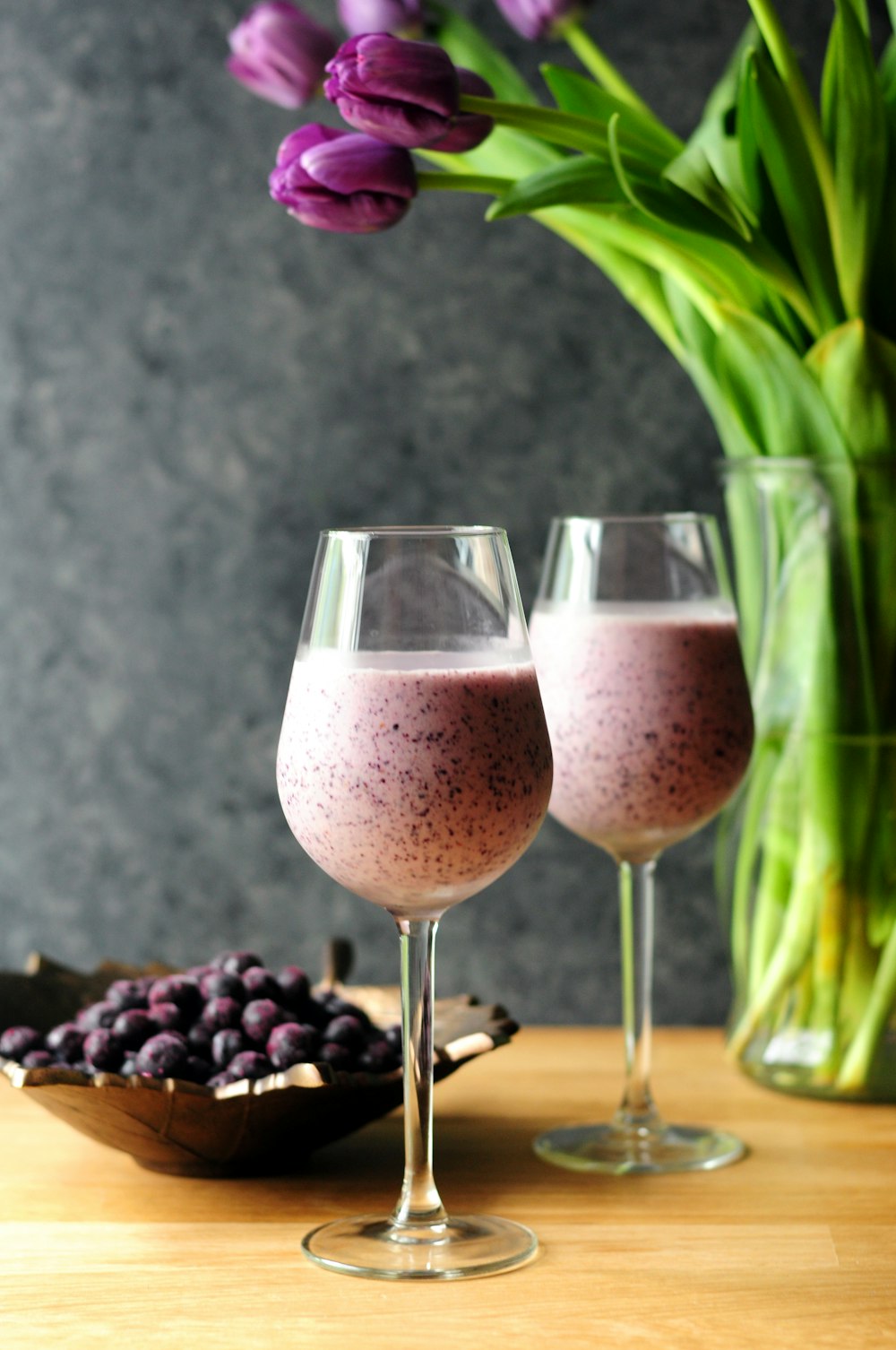 two berry shake on drinking glasses