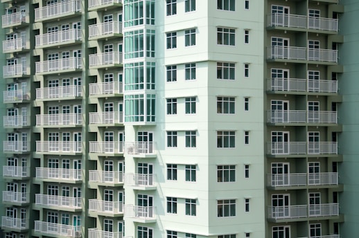 white and green building