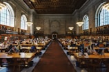 group of people inside the library