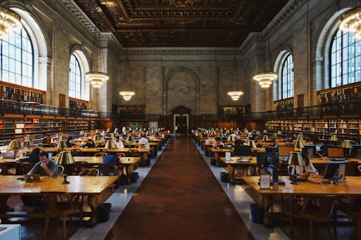 group of people inside the library