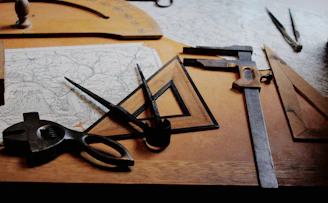 drafting instruments on top of table
