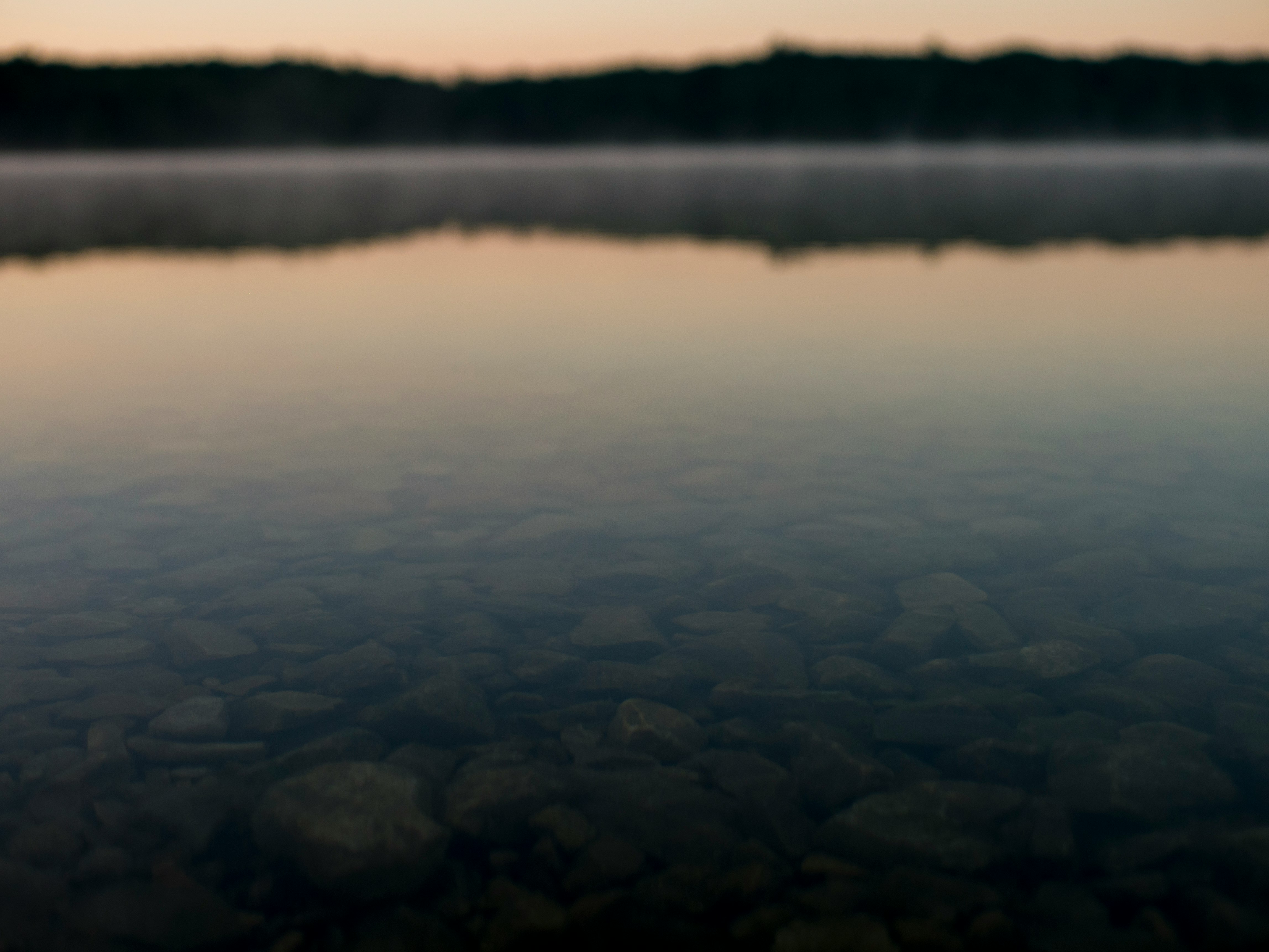 body of water with bokeh effect
