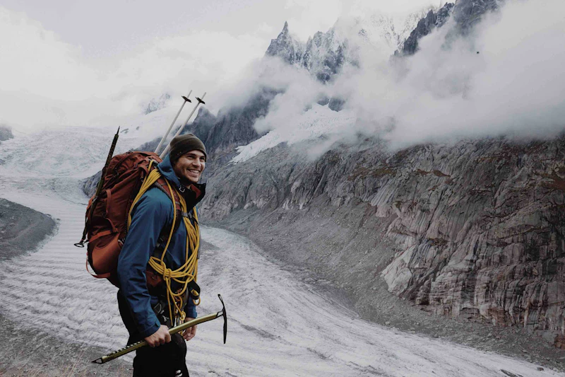 Climber standing near the mountain