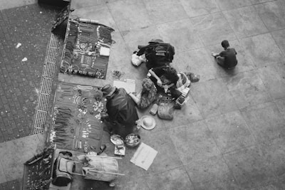 An aerial view of a bustling marketplace with various goods.