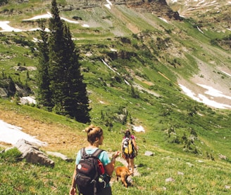 woman walking down the hill at daytime