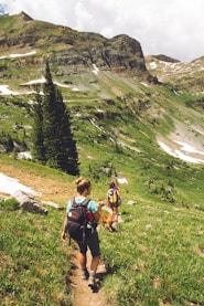 woman walking down the hill at daytime