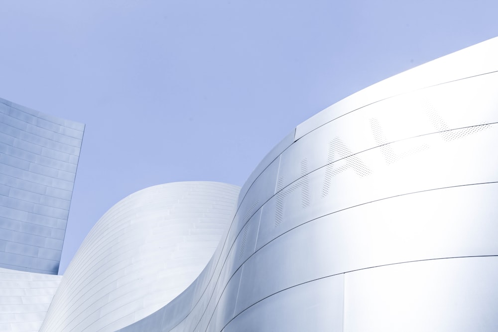 white concrete building under blue skky