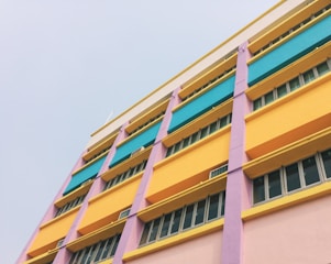 An office building with vibrant colors on its facade.