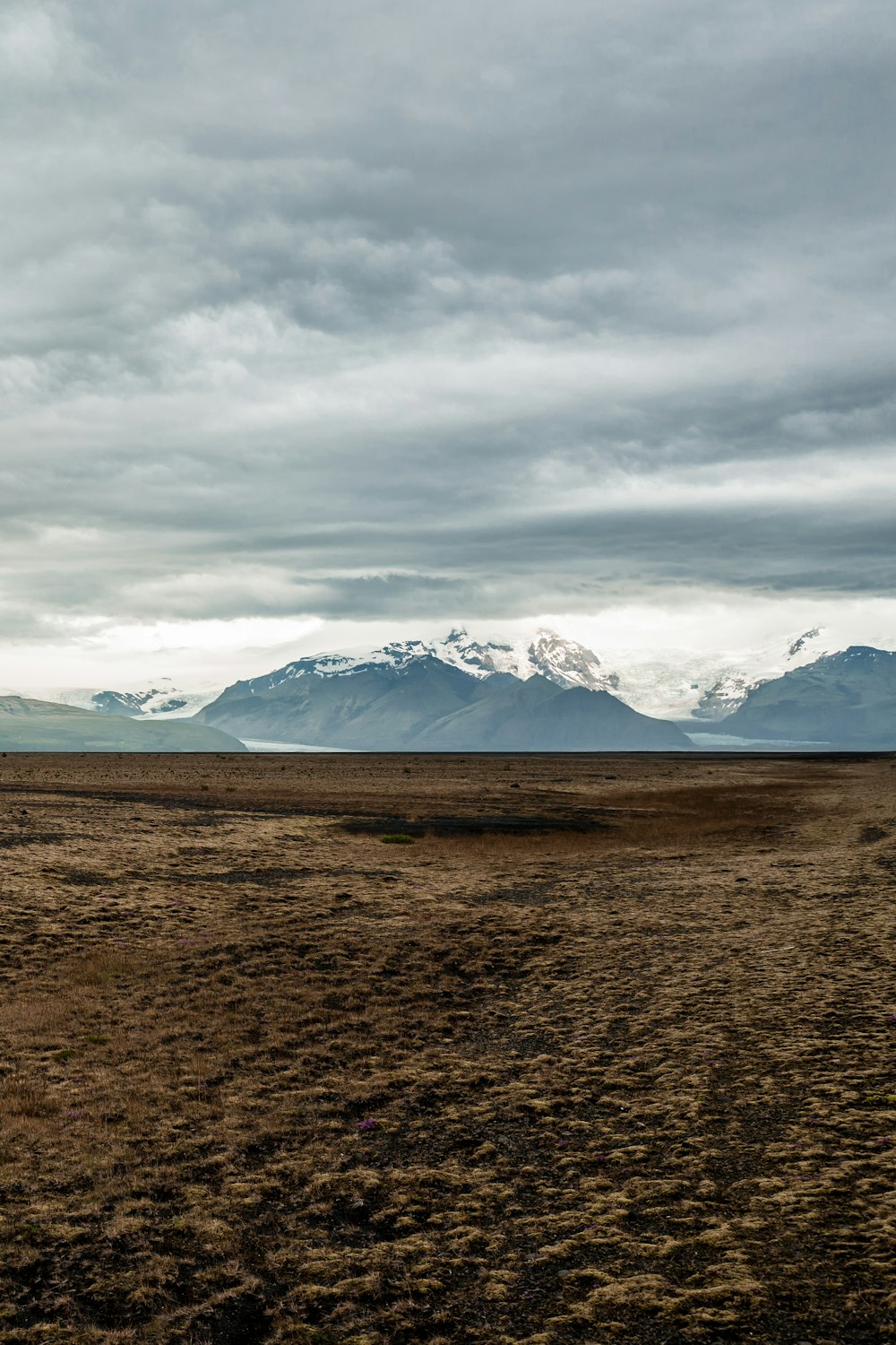 snowcap mountain under cloudy sky taken at daytime