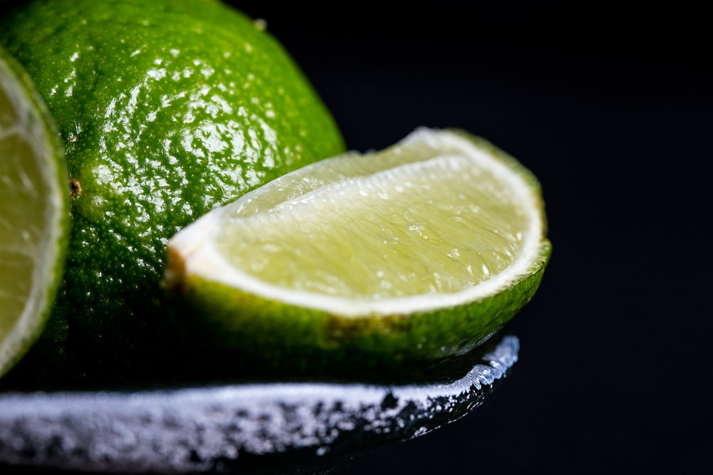 sliced lime on grey bowl