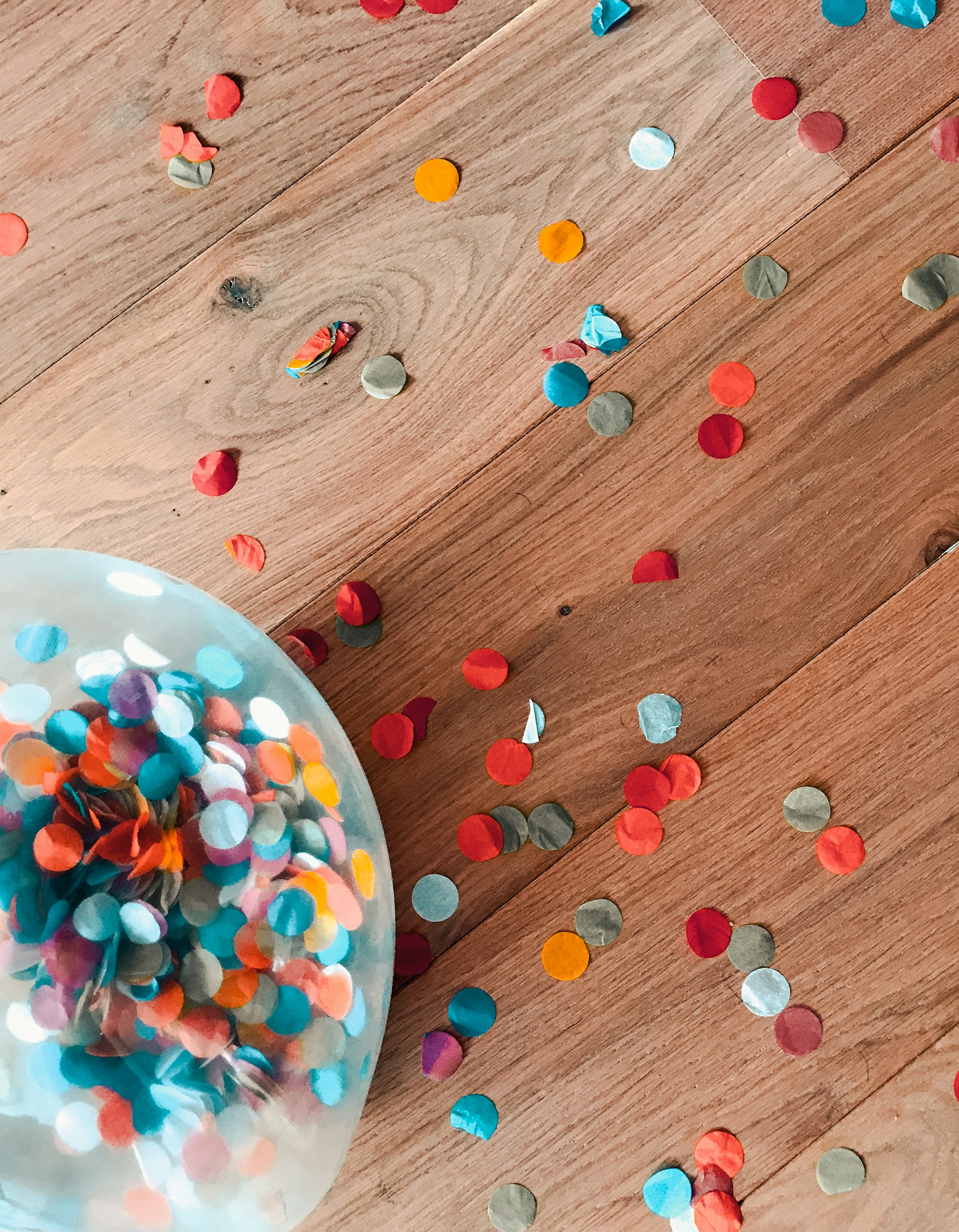 assorted-color of sprinkle dots on brown floor