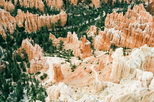 postal aerial photography of brown rock formations at daytime in Bryce Canyon National Park United States