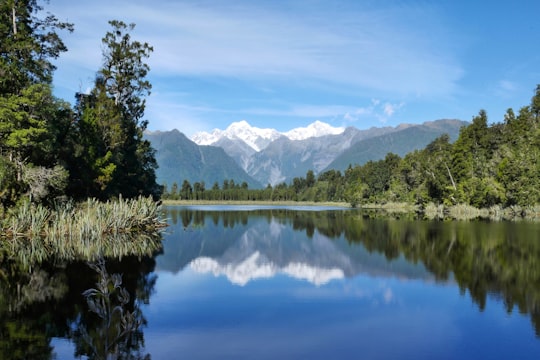 photo of Lake Matheson Lake near Mount Cook
