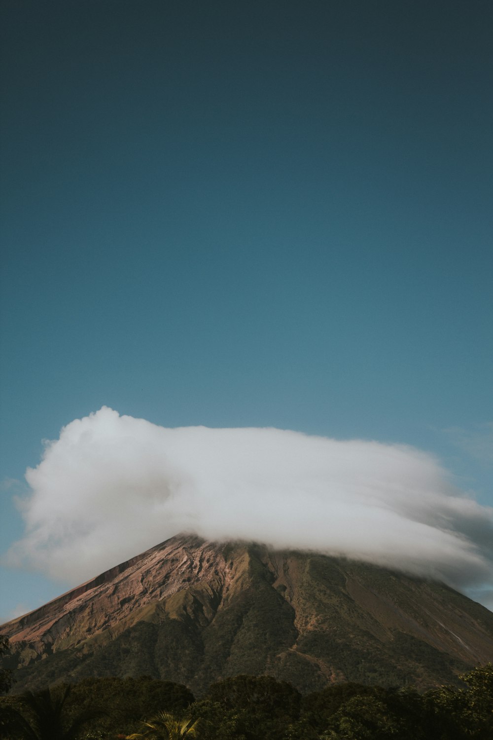 Clouds above mountain under clear blue sky photo – Free Grey Image on ...