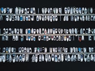 An aerial view of multiple boats docked at a marina.