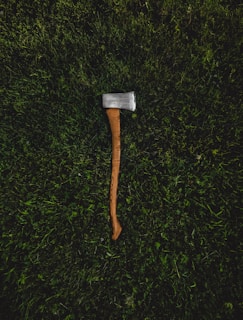 brown and silver pickaxe