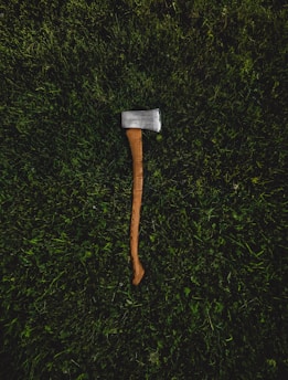 brown and silver pickaxe