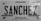 A black and white license plate from Michoacán, Mexico, displaying the name 'SANCHEZ' in bold letters. The plate includes a map outline of the region and text reading 'Transporte Privado Automovil'. Various official symbols and serial numbers are visible.
