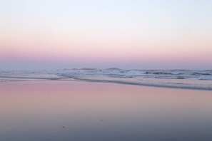 A serene beach sunset in a hidden gem destination.