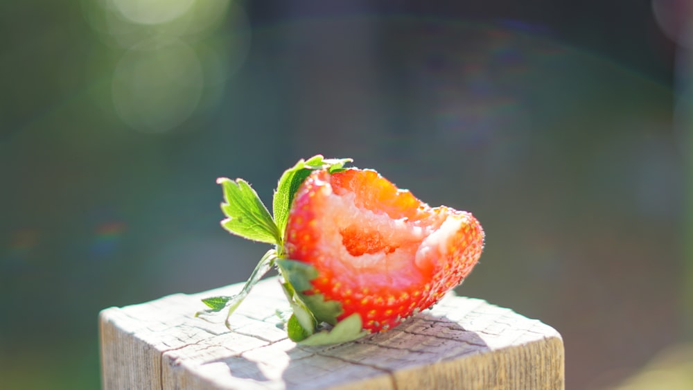 strawberry on wood slab