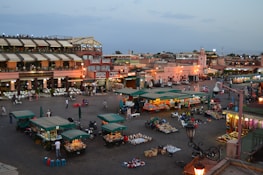 Lille's lively market square filled with locals and fresh produce stalls.