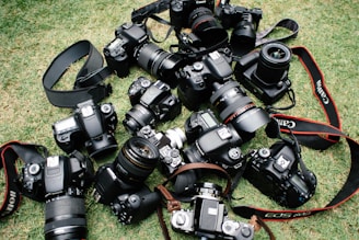 high angle photo of DSLR cameras