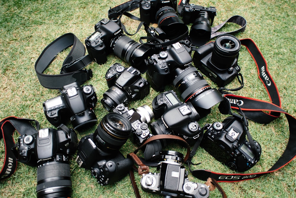 high angle photo of DSLR cameras