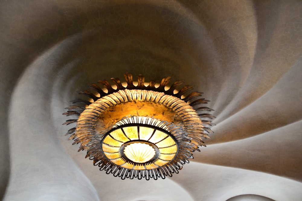 round brass-colored framed light fixture