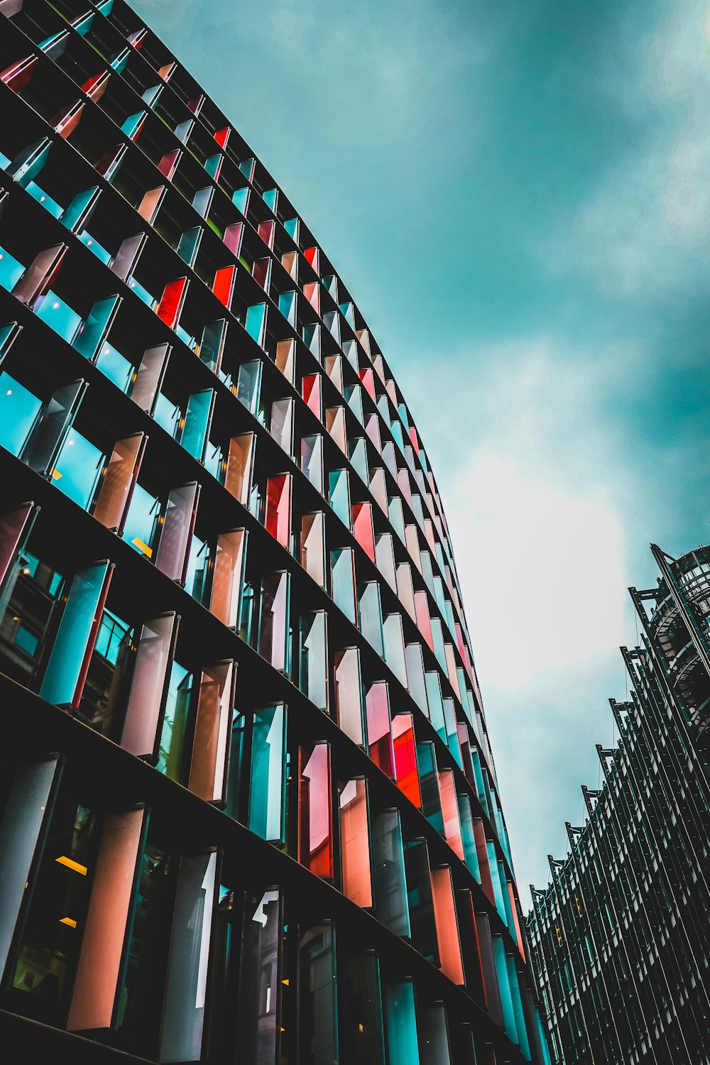 multicolored building under cloudy sky