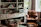 A cozy living room with a vintage chair that looks freshly restored.