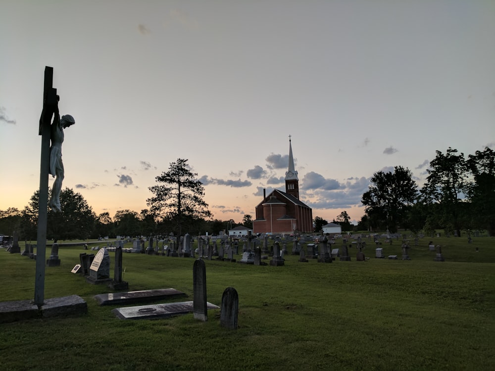brown church near cemetery