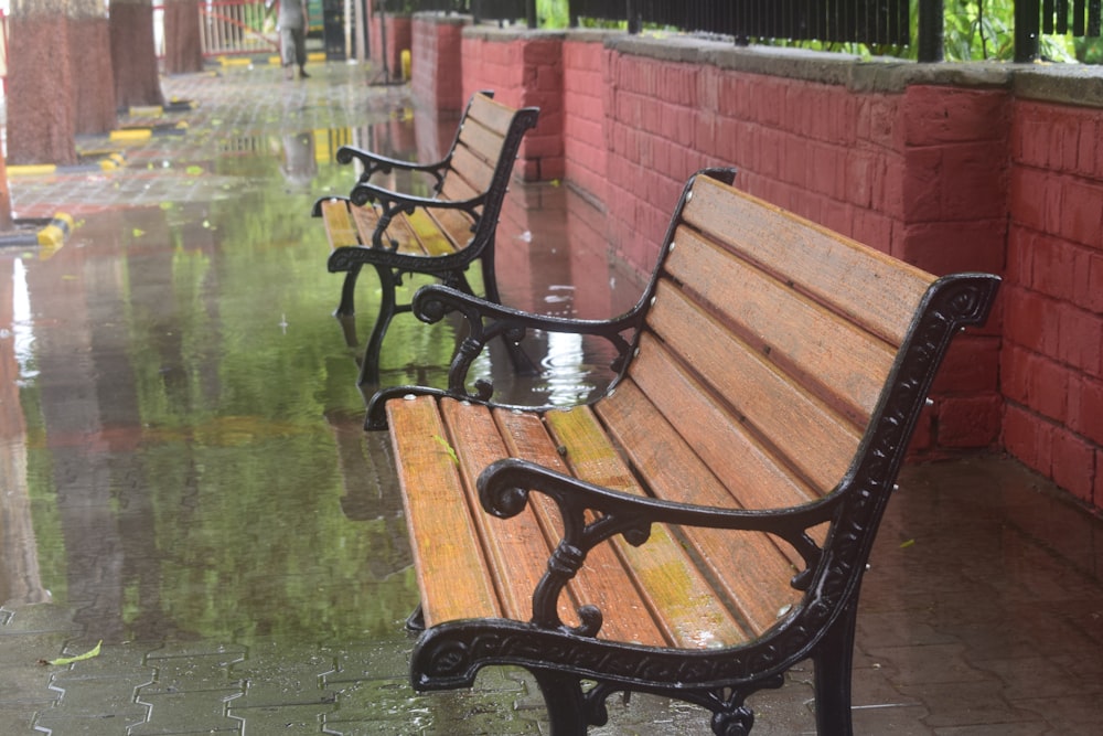 two brown wooden benches