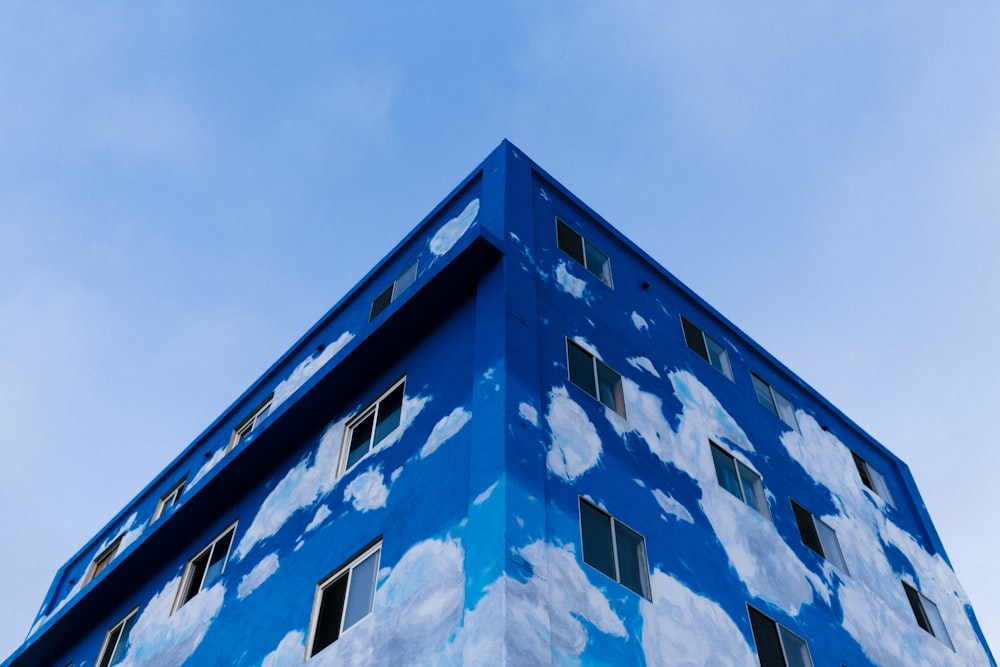 blue high-rise building under blue sky