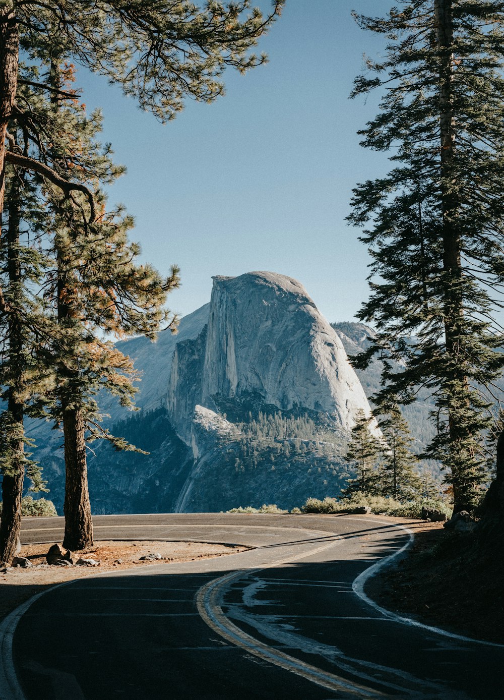 road leading to mountain at daytime