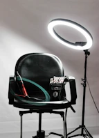 red and black steel tube on black leather padded chair