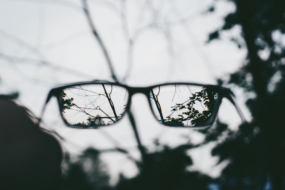 Brille mit schwarzem Rahmen Fotografie