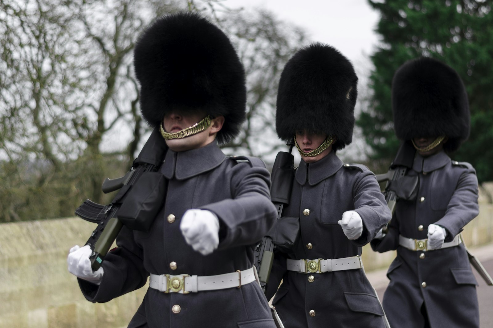 Nikon D5100 + Nikon AF-S Nikkor 50mm F1.8G sample photo. Three queen's guards carrying photography