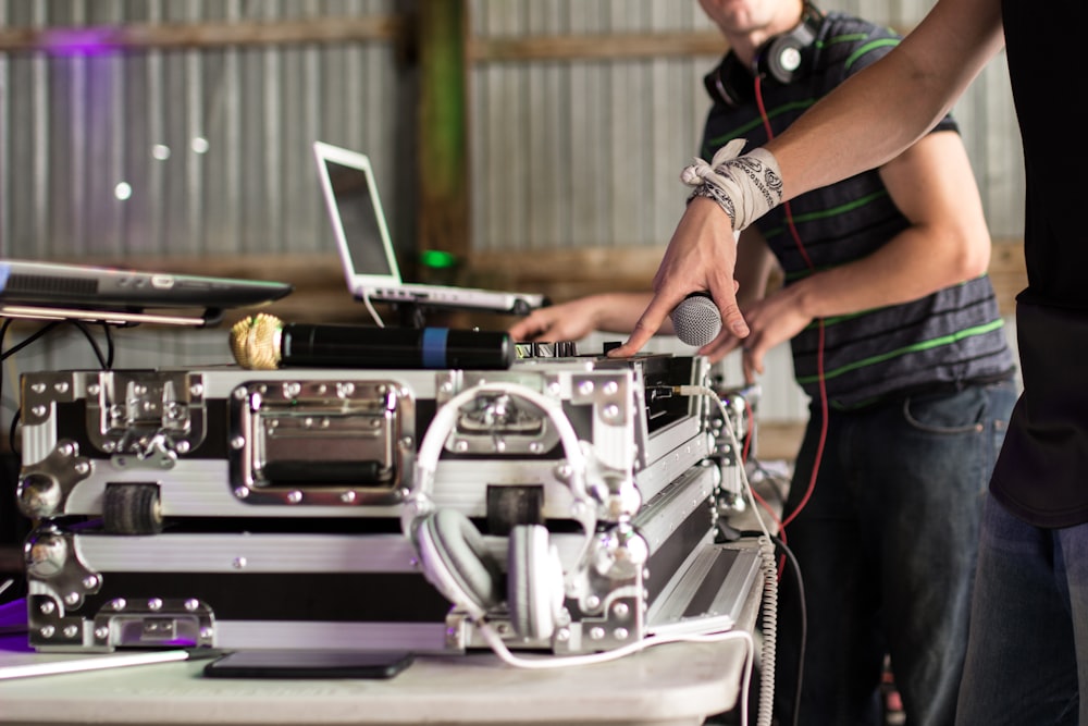 person using DJ turntable