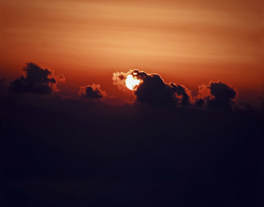 silhouette of clouds at sunset