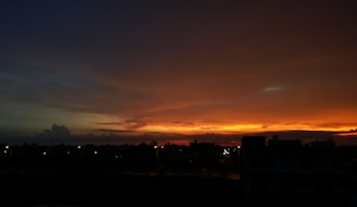 A stunning sunset over a Brazilian city skyline.