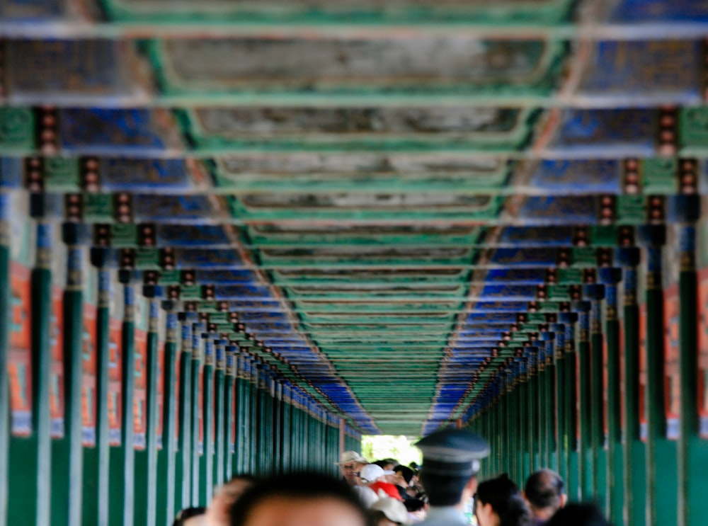 people walking in tunnel