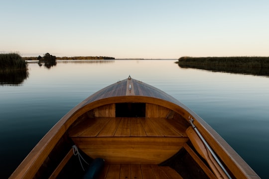 landscape photography of brown boat surrounded by body of water during daytime in Dunö Sweden