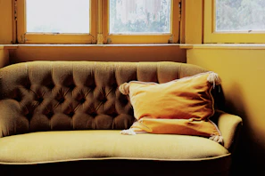 Classic style sofa with plush seating in a cozy waiting space