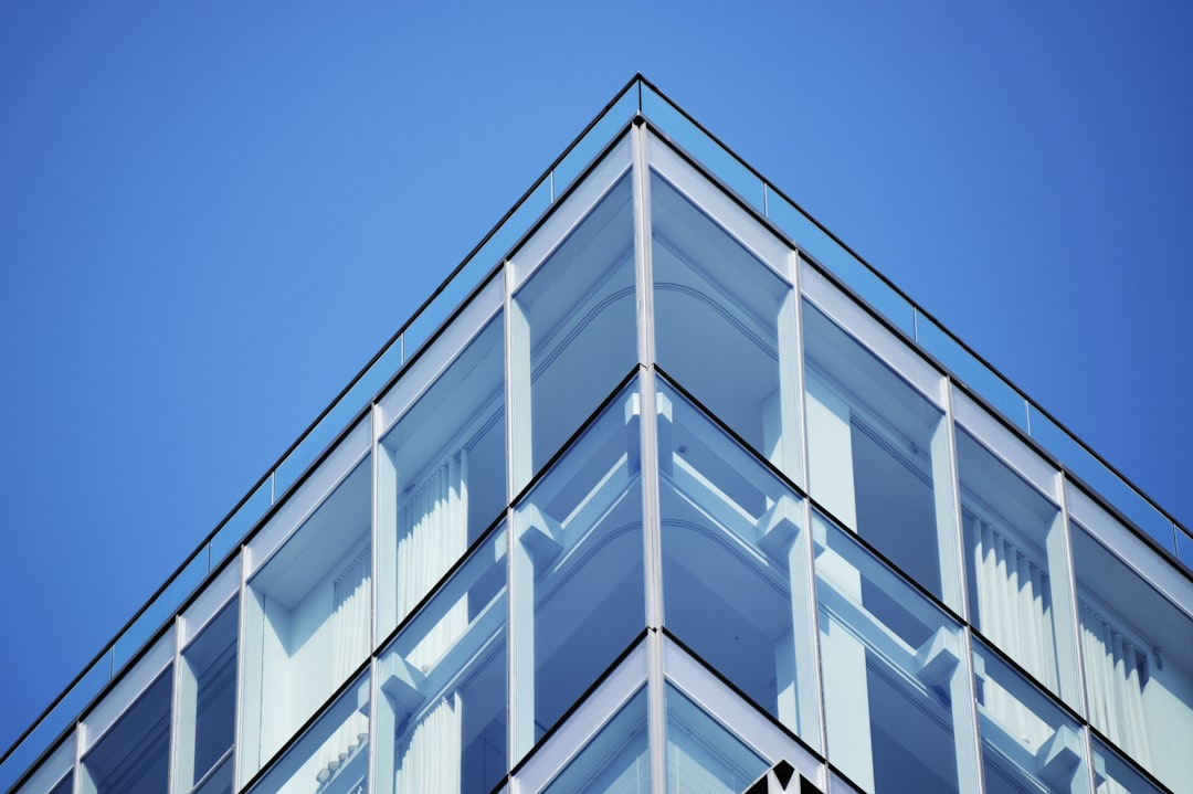 white concrete building under blue sky during daytime